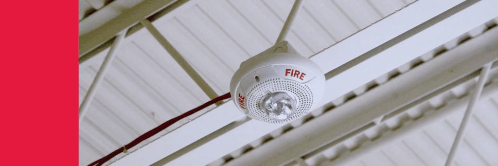 Image banner of a fire alarm strobe in the ceiling